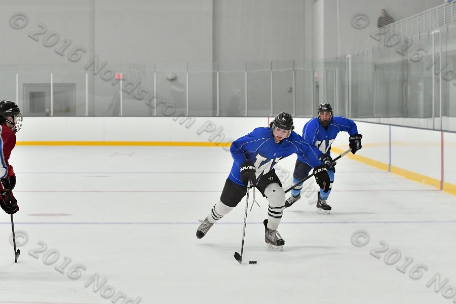 Wheaton College Men\'s Ice Hockey vs Middlesex Community College. - Photo By: KEITH NORDSTROM